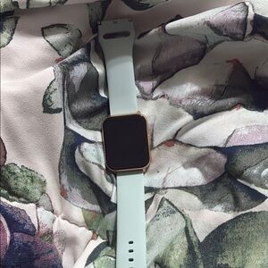 Smartwatch with Gold and White Band